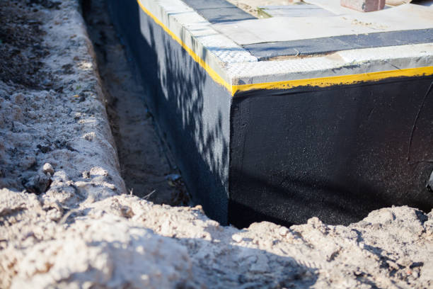 Professional Waterproofing technician working in Sherwood, WI